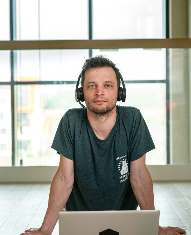 programmer at an online meeting of coworkers.